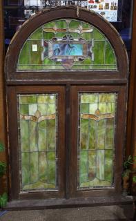 Appraisal: Framed stained glass window Framed stained glass window having an