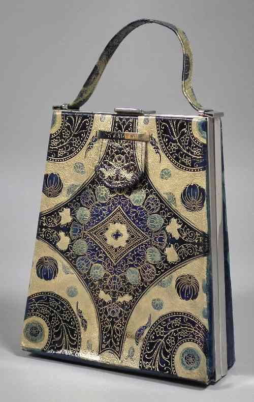 Appraisal: A gilt tooled blue leather handbag of Art Nouveau design