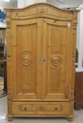 Appraisal: PINE DOUBLE-DOOR WARDROBE Continental th century having a molded arch