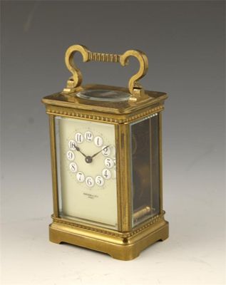 Appraisal: A French brass carriage timepiece with a replaced platform lever