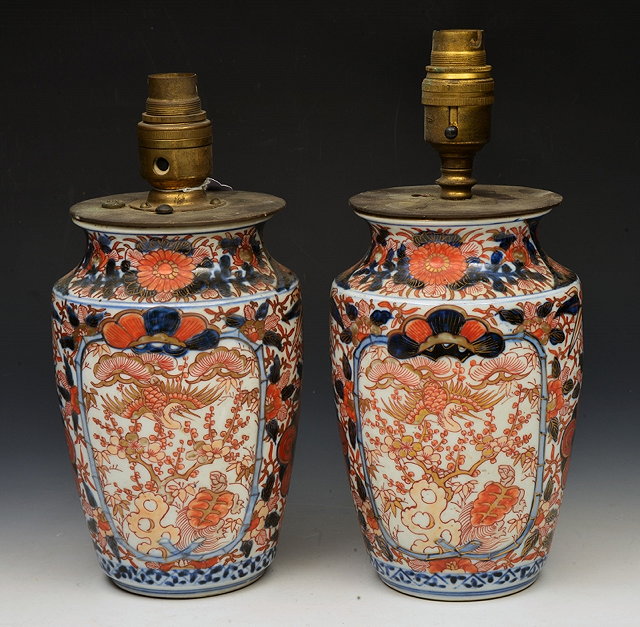 Appraisal: A PAIR OF JAPANESE IMARI VASES of baluster form each