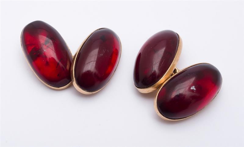 Appraisal: PAIR OF RED AMBER CUFFLINKS With heat treatment Estimate -