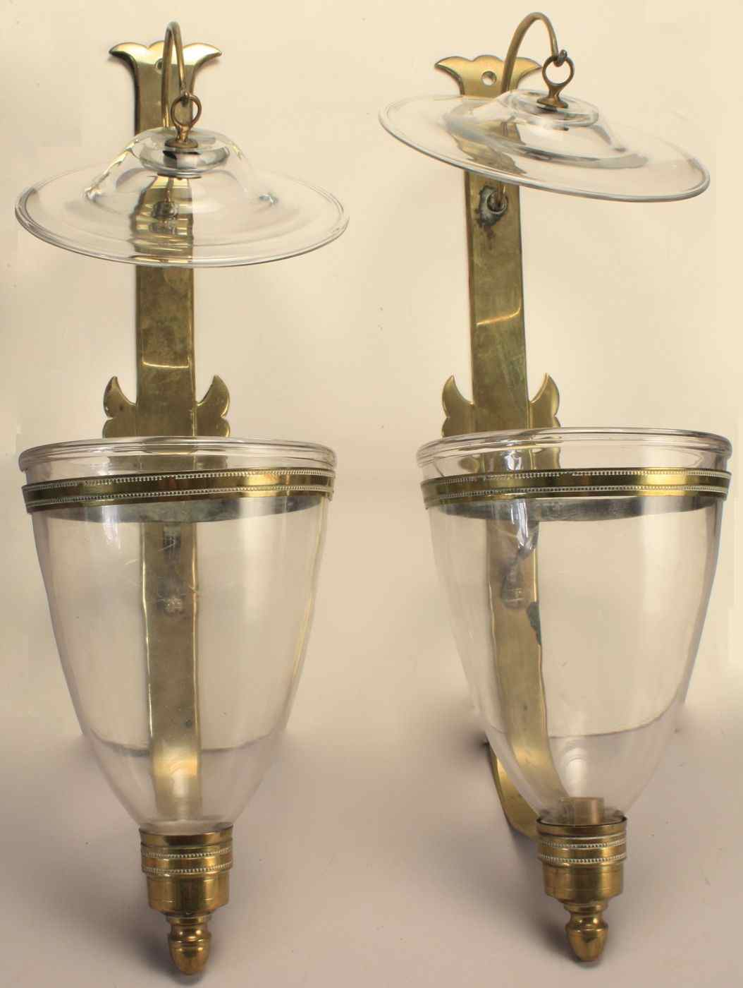 Appraisal: PAIR OF BRASS WALL SCONCESEarly th CenturyFree blown globes with