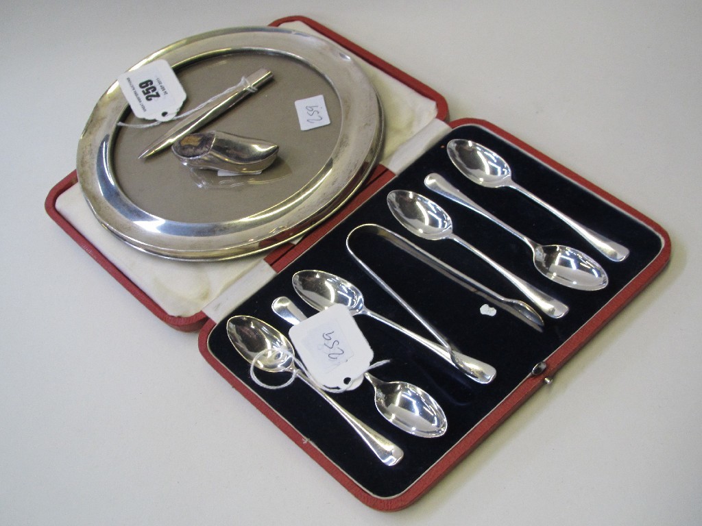 Appraisal: Lot comprising cased silver spoons with tongs silver photo frame