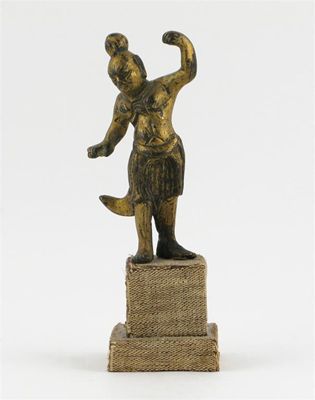 Appraisal: A small gilt bronze figure in a theatrical pose standing