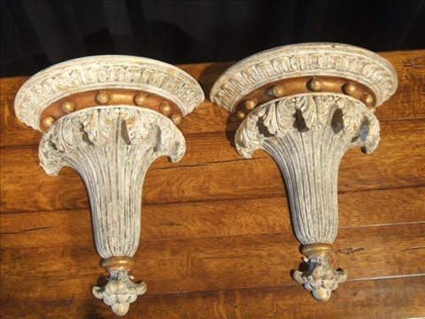 Appraisal: PAIR OF PARCEL GILDED WOOD WALL BRACKETS Each formed as