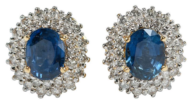 Appraisal: kt Sapphire and Diamond Earrings cluster design one with oval