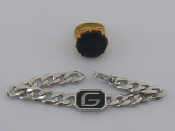 Appraisal: A mixed lot comprising a silver gilt onyx ring and