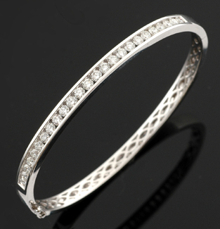 Appraisal: A diamond bangle The ct white gold hinged bangle channel