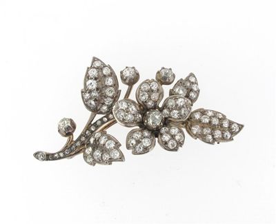 Appraisal: A Victorian diamond floral brooch Set overall with graduated diamonds