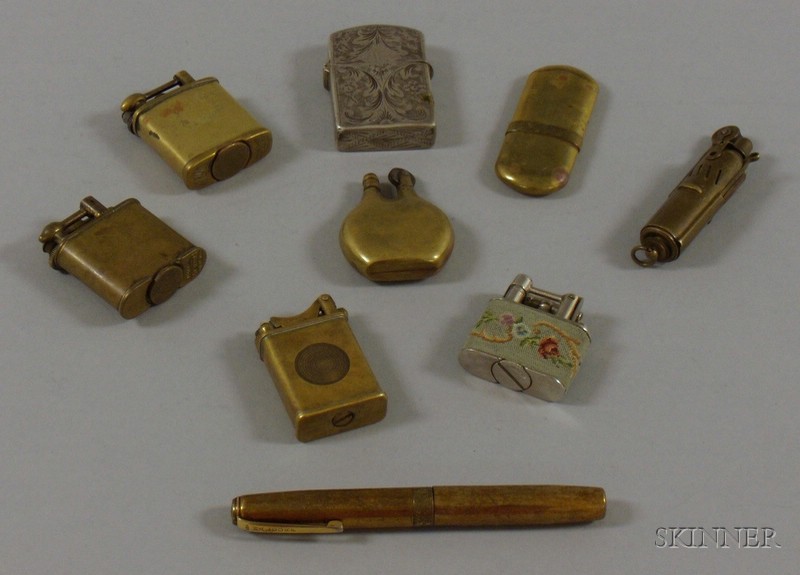 Appraisal: Nine Metal Lighters mostly early th century one pen-form two