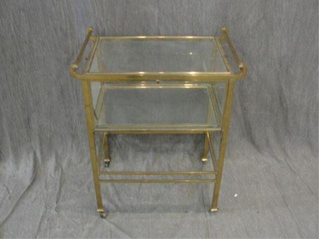 Appraisal: Art Deco Brass and Glass Serving Cart From a prominent