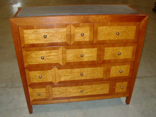 Appraisal: Baker Furniture Company Chest with multiple drawers birds eye maple