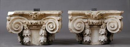 Appraisal: TWO CAST STONE COMPOSITE CAPITALS Each shaped top with Ionic