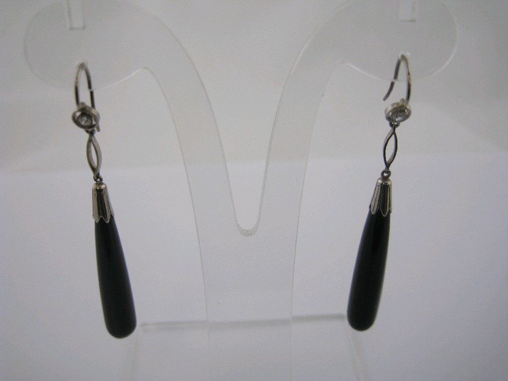 Appraisal: A pair of Onyx and Diamond Ear Pendants each collet-set