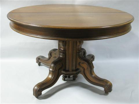 Appraisal: VICTORIAN CIRCULAR MAHOGANY DINING TABLE th century with additional leaves