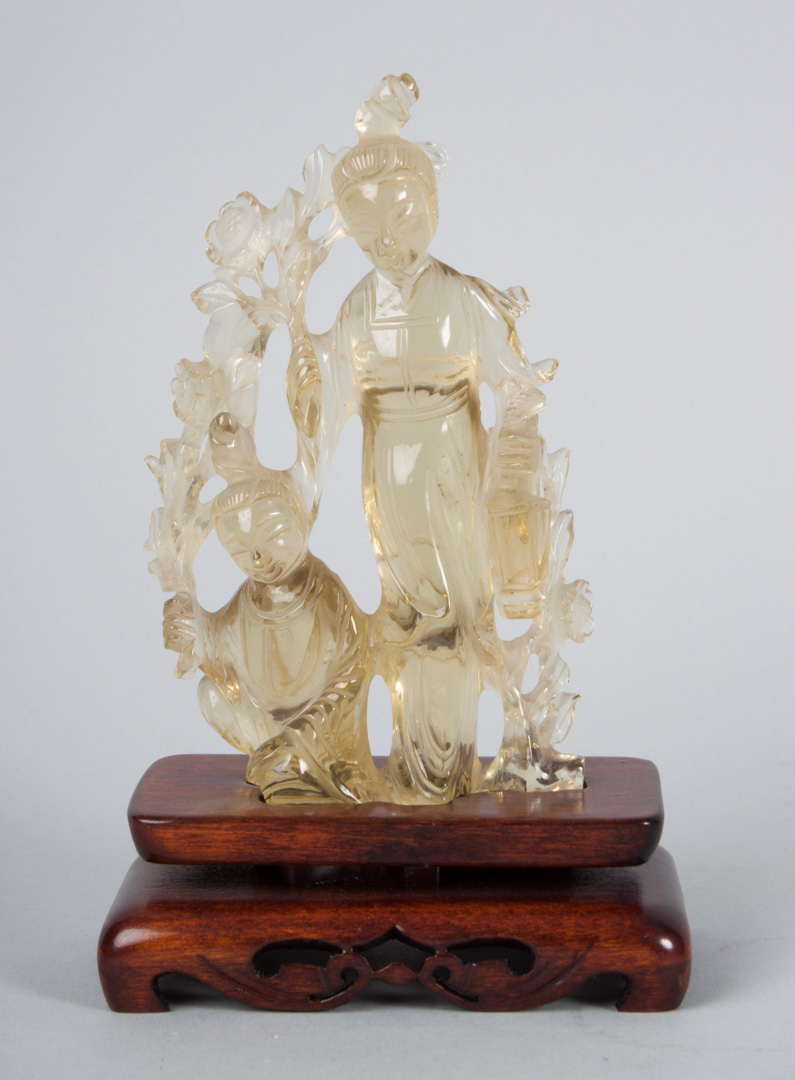 Appraisal: Chinese carved citrine figural group modeled as standing woman holding