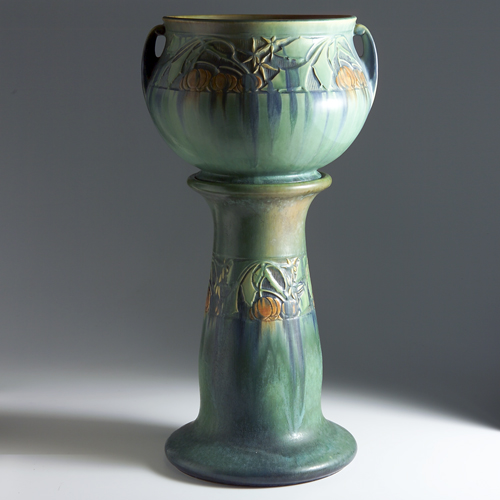 Appraisal: ROSEVILLE Green Baneda jardiniere and pedestal set Opposing lines to