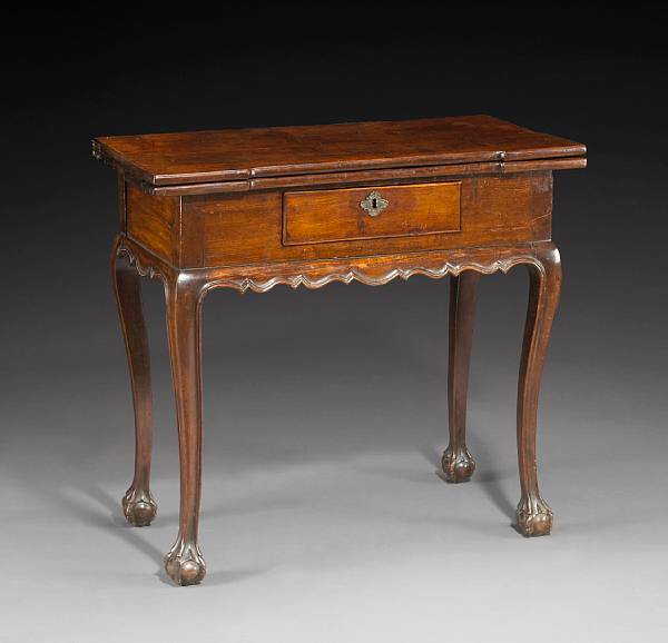 Appraisal: A Portuguese or Portuguese Colonial Rococo walnut games table third