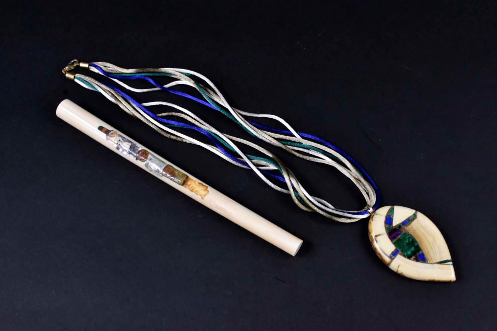 Appraisal: TWO INUIT INLAID ARTIFACTSThe first a Tlingit mother-of-pearl inlaid staff