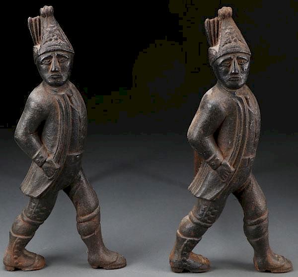 Appraisal: A PAIR OF CAST IRON HESSIAN SOLDIER ANDIRONS A PAIR