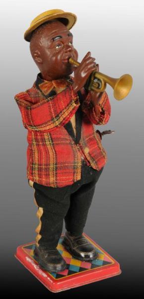 Appraisal: Lot of Miscellaneous Toys Description Includes Japanese Louis Armstrong wind-up