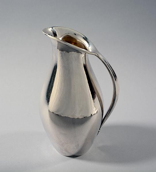 Appraisal: Silver Georg Jensen water pitcher Silver Georg Jensen water pitcher