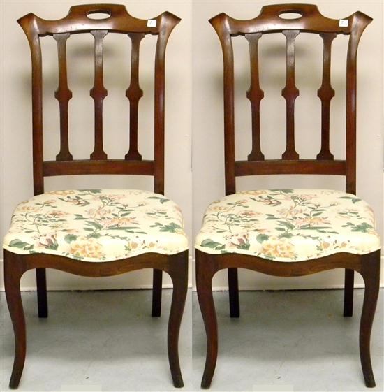 Appraisal: Pair of French Provincial style chairs three vertical splats shaped