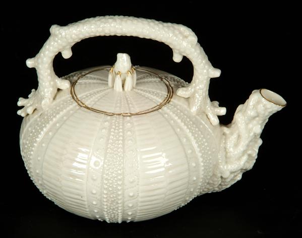 Appraisal: A Belleek First Period 'Echinus' teapot and cover highlighted with