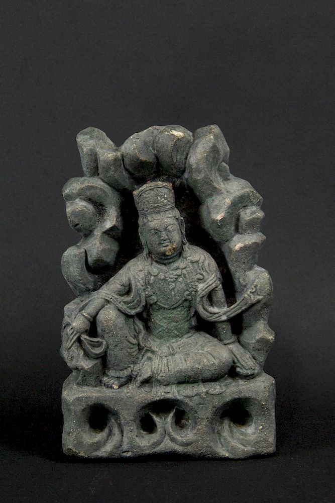 Appraisal: A Carved Stone Figure of Seated Guanyin Chinese The Chinese