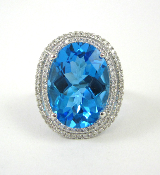 Appraisal: SWISS BLUE TOPAZ AND DIAMOND RING k white gold with