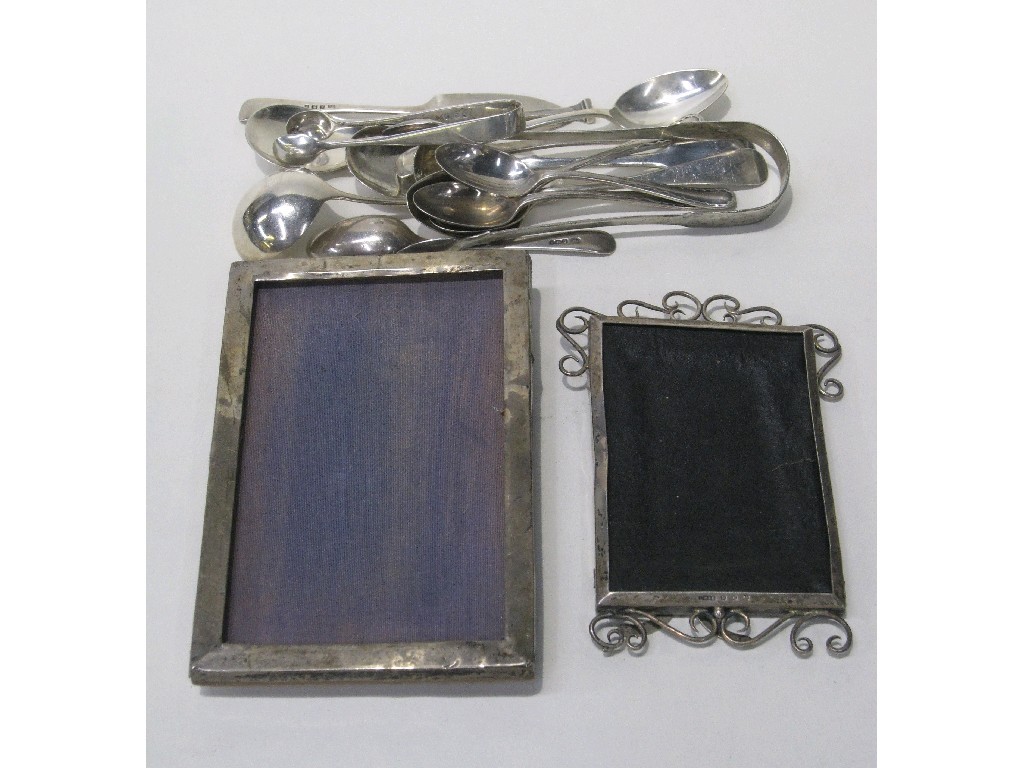 Appraisal: Lot comprising two silver photo frames and assorted loose silver