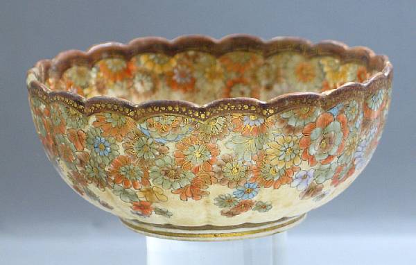 Appraisal: A Satsuma style pottery bowl Of chrysanthemum flower form with