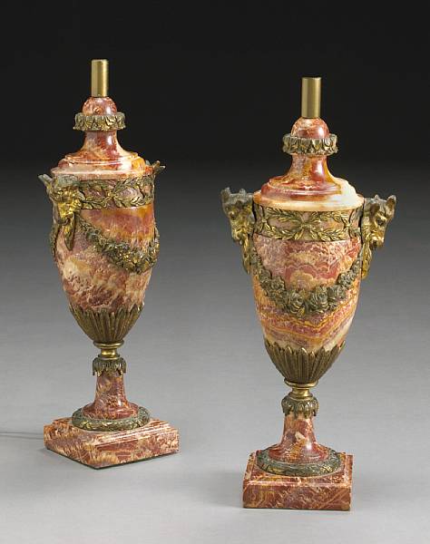 Appraisal: A pair of Louis XVI style gilt bronze and variegated