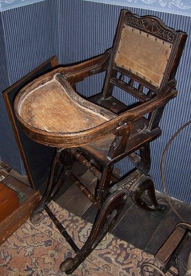 Appraisal: A child's Victorian high chair the turned frame adjustable and