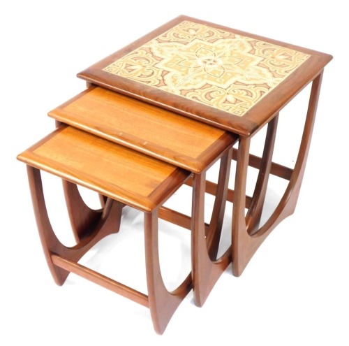 Appraisal: A nest of three retro G-Plan teak coffee tables the