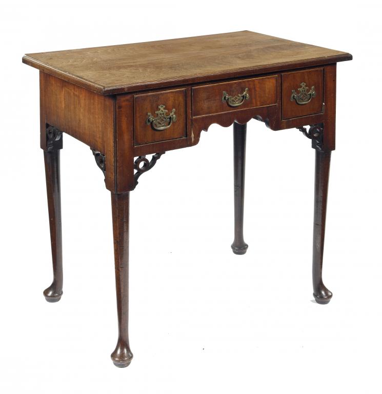 Appraisal: A GEORGE III MAHOGANY LOWBOY the figured top in matched