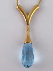 Appraisal: A carat gold blue topaz necklace with sliding adjustable length