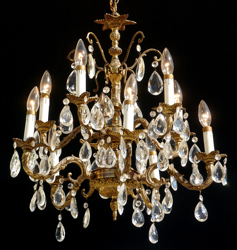 Appraisal: BRASS AND LEAD CRYSTAL CHANDELIER Lights metal tag ''Made in