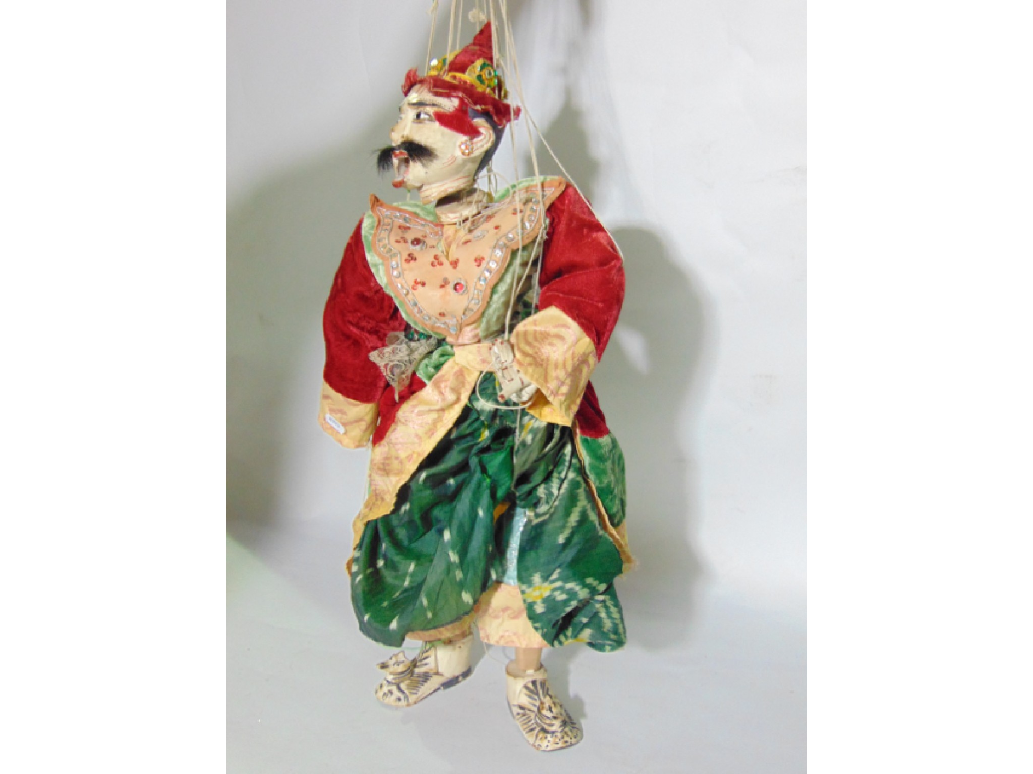 Appraisal: An Eastern puppet in the form of a male character