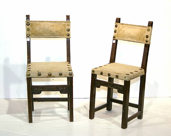 Appraisal: A set of four Continental Baroque walnut side chairs partially