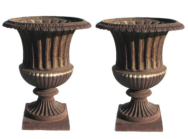 Appraisal: A pair of large campana form cast iron urns height