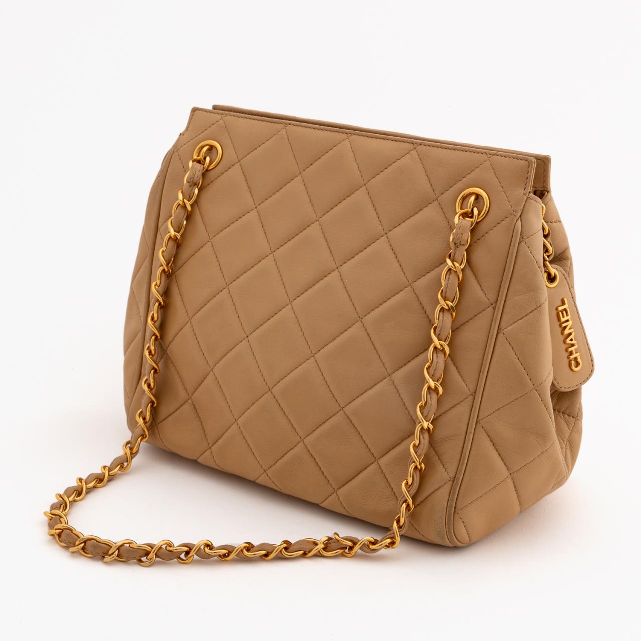 Appraisal: CHANEL CREAM ZIP-TOP LEATHER QUILTED SHOULDER BAG Chanel French -