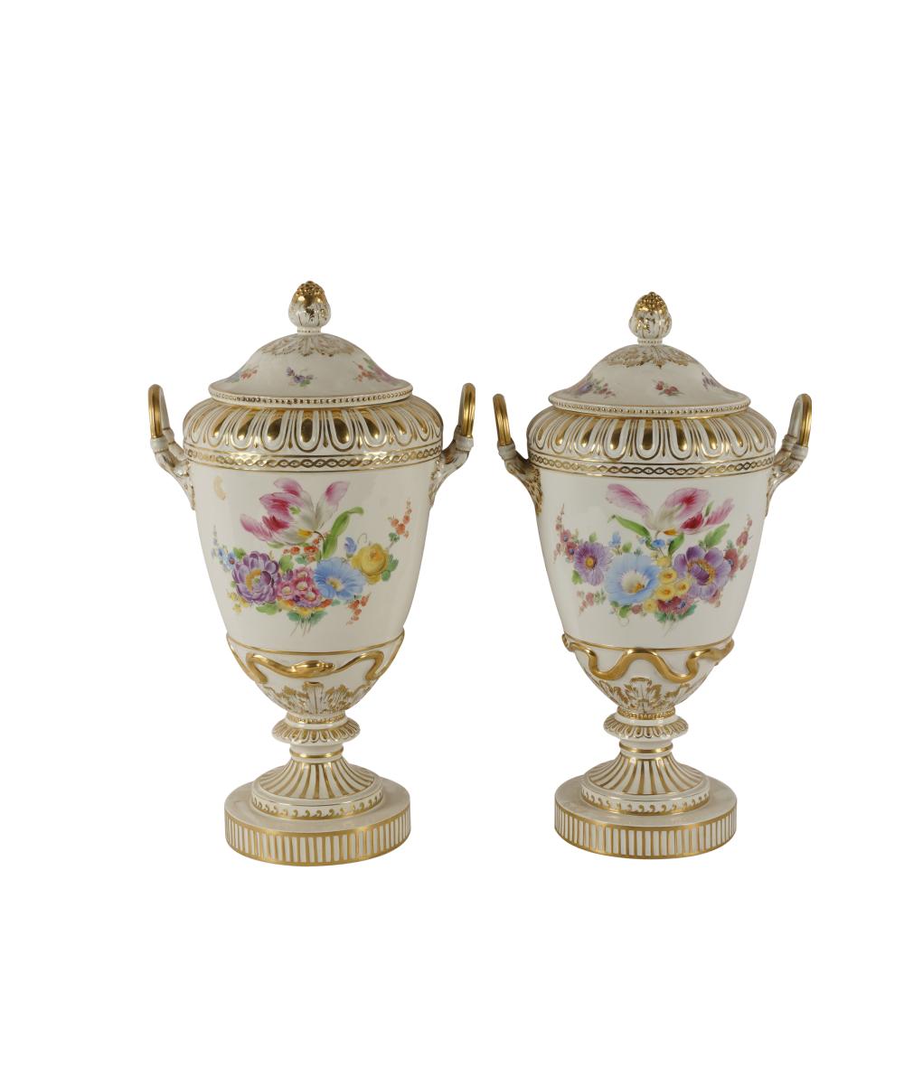 Appraisal: PAIR OF BERLIN KPM PORCELAIN URNS COVERSeach with blue sceptre