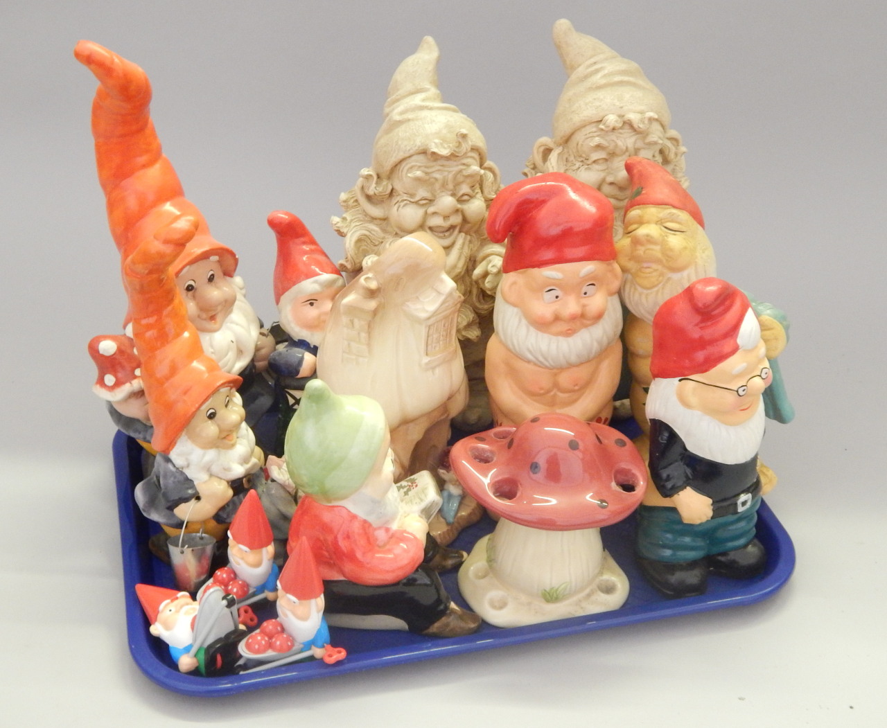 Appraisal: Various garden gnome related items to include a pixie mushroom