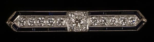 Appraisal: An Art Deco diamond and synthetic sapphire brooch circa the