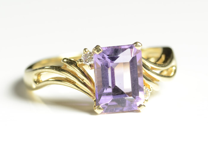 Appraisal: AMETHYST DIAMOND AND FOURTEEN KARAT GOLD RING with two round-cut