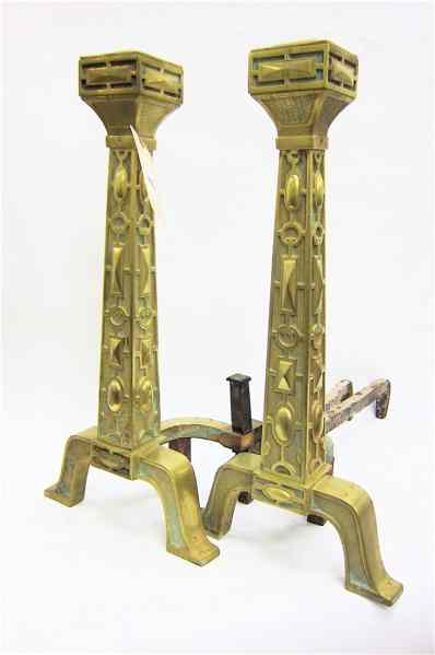 Appraisal: A TALL PAIR OF CAST BRASS ANDIRONS of tapered column