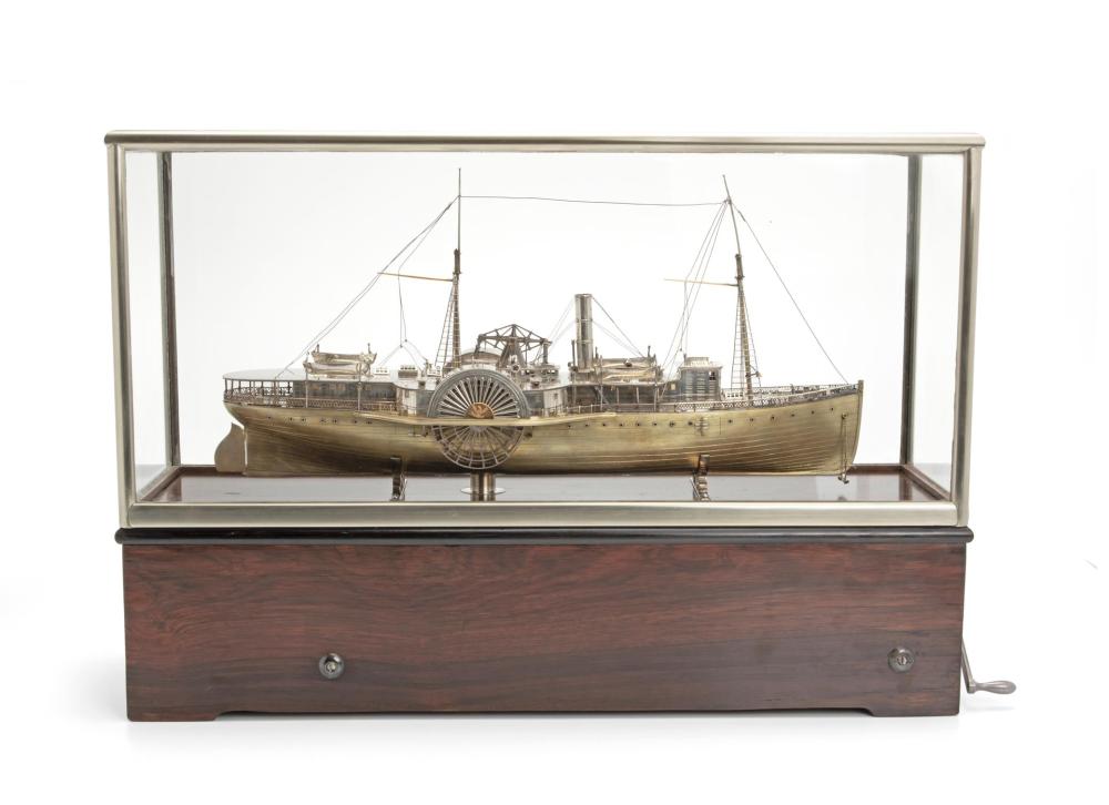 Appraisal: A silvered and gilt model of the American paddle steamer