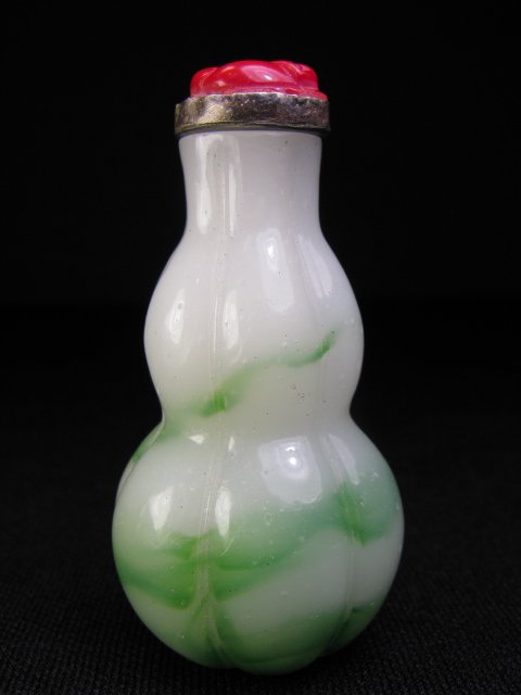 Appraisal: Chinese Peking glass white with a touch of green double